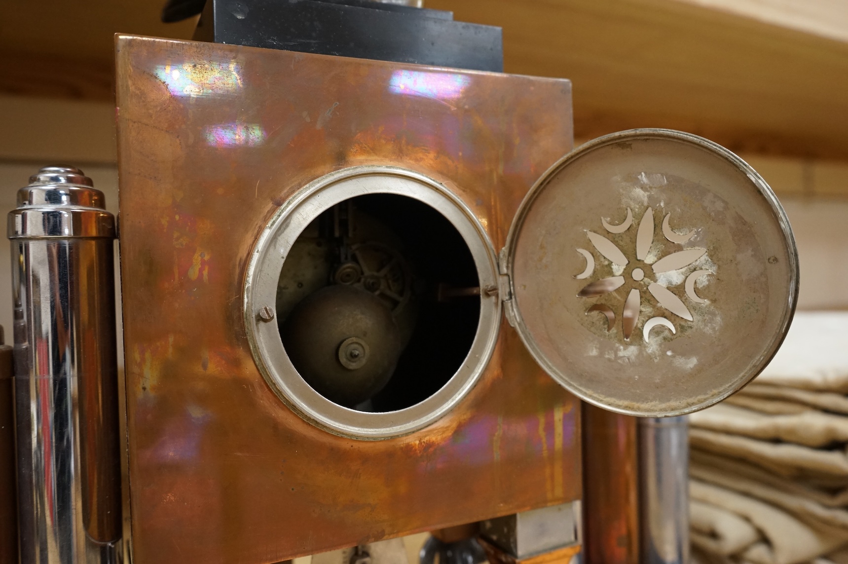An French Art Deco copper and chrome mantel clock, with bronze seagull surmount, 57cm high